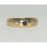 9ct gold diamond and sapphire gypsy ring size M