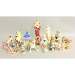 Collection of china figurines to include Hummel figures