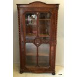 Burr Walnut glazed bookcase after the style of Beamier