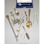 Collection of silver cutlery and sugar tongs