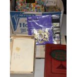 Box containing large quantity of stamps, loose and in albums.