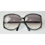 Vintage Christian Dior sunglasses and a magnified set of engineers glasses