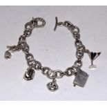 Links of London silver charm bracelet and charms