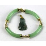 A 14ct yellow gold and jade bracelet with a jade pendant necklace