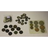 A collection of British coins, including an Anne sixpence 1711, a George II shilling 1743 roses, a