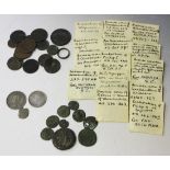 A collection of twenty-three Roman and other ancient bronze coins, including some copies, a Henry