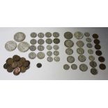 A group of USA coins, including a Morgan dollar 1921 and two Peace dollars, 1922 and 1925, a group