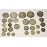 A collection of British pre-1920 silver coins, including a William III half-crown, possibly 1696,
