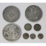 A George III crown 1819, a George IV crown 1821, a George VI crown 1951, two threepences, 1912 and