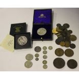 A collection of British coins, including two florins, 1931 and 1936, seven threepences, a penny