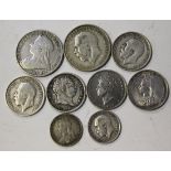 A group of British pre-1920 silver coins, comprising five crowns, 1821, 1822, 1889, 1889 and 1895,