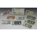 A collection of Bank of England banknotes, comprising a five pounds note P.S. Beale 18 June 1952,