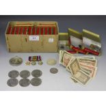 A collection of British and foreign coins, including a USA dollar 1921, a Panama half-balboa 1947