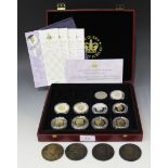 A group of nine silver proof crown-size coins commemorating the Queen's Golden Jubilee 2002, a crown