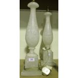 A pair of 20th Century white-toned alabaster table lamps, the ovoid bodies on square bases, height