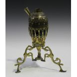 A 19th Century Middle Eastern brass hookah pipe, decorated with silver inlaid flowerheads, raised on