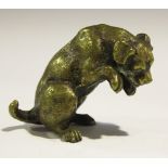 A late 19th Century Austrian cast bronze model of a dog on its hind legs, height approx 5.5cm.