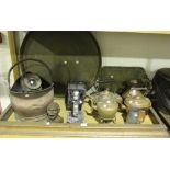 A collection of various brass and copperware, including two copper kettles, a coaching lamp and a