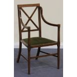 An Edwardian mahogany elbow chair with satinwood banding and boxwood stringing, on square tapering