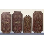 A group of four 20th Century boulle work panels, each mottled red painted wooden panel inlaid with