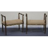 A pair of early 20th Century French giltwood window seats, with carved acanthus leaf and fluted