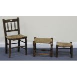 An early 20th Century beech framed child's chair and two stools, all with woven seats.