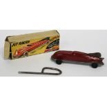 A JHR tinplate jet car, finished in burgundy, length approx 15cm, boxed, with key (some playwear,