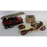 A Mamod SA1 live steam car, a Meccano fire truck and an Astra searchlight, boxed (playwear, paint