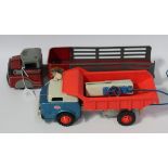 A Gama tinplate and plastic battery powered remote control tipper lorry, length approx 32cm,