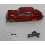 A Prameta die-cast clockwork Mercedes-Benz saloon car with programmable steering and forward and