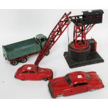 A Shackleton Toys clockwork FG6 six wheeled tipper lorry, finished in green with red wings, a Chad