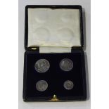 An Edward VII four-coin Maundy set 1904, with a dated case.