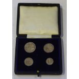 An Edward VII four-coin Maundy set 1905, with a dated case.