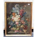 A late 19th Century woolwork rectangular panel depicting a Dutch style still life vase of flowers