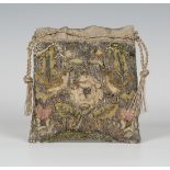 A 17th Century needlework and silver thread rectangular purse, one side decorated with two birds
