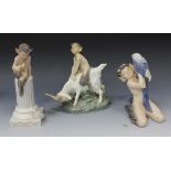 A Royal Copenhagen porcelain figure group, circa 1936, modelled as a faun seated on a goat, on a