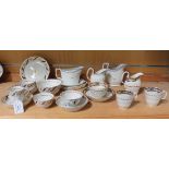 A small collection of Staffordshire porcelain teaware, early 19th Century, probably Factory X,