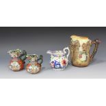 A pair of Mason's Patent Ironstone graduated octagonal jugs, 19th Century, each decorated with