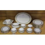 A Minton 'Aragon' pattern bone china part dinner service, comprising an oval serving platter,