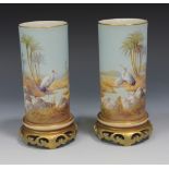 A pair of Royal Worcester bone china vases, circa 1911, by William Powell, signed, each