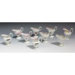A group of nine Staffordshire porcelain cream jugs, circa 1800, including Factory X, of fluted