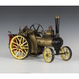 A 1 inch scale coal fired model of a Burrell single cylinder traction engine with working steering