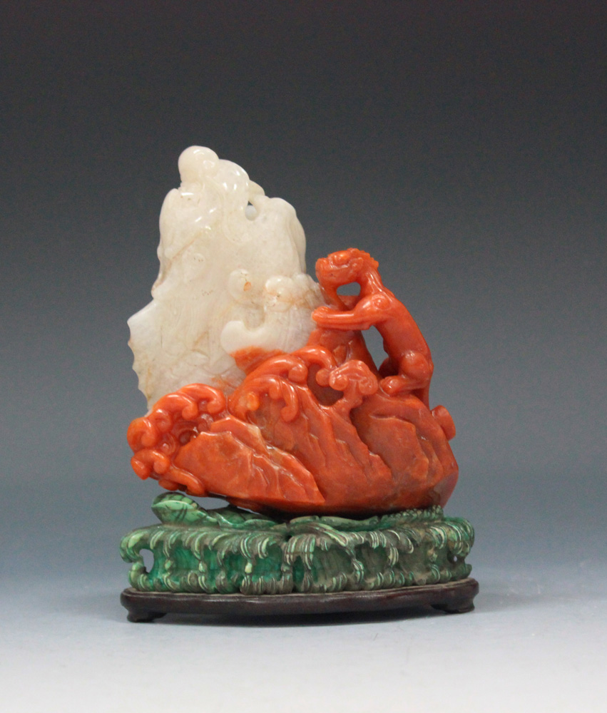 A Chinese two-tone agate vase, 20th Century, the pale grey and red stone carved with a leaping - Image 3 of 12