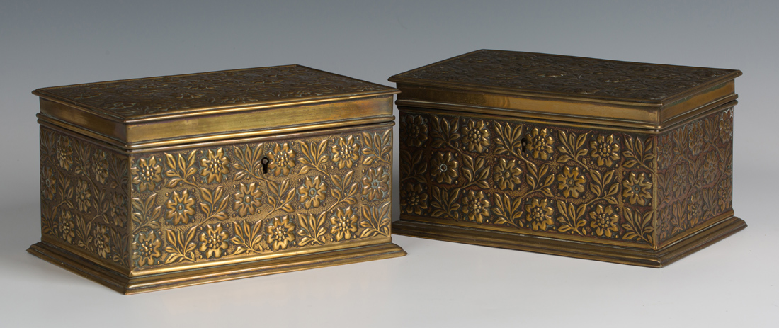 A pair of late Victorian Aesthetic period embossed brass boxes, possibly by Morris & Co, one
