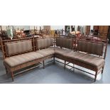 An early 20th Century French faux bamboo turned walnut corner settee with upholstered seats and