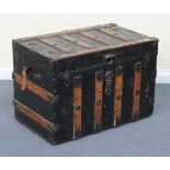 A 19th Century American wood and metal bound travelling trunk with applied studwork decoration,