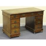 A Victorian mahogany twin pedestal desk, the top inset with a green gilt-tooled leather writing