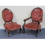 A mid-Victorian rosewood framed gentleman's salon armchair, upholstered in pink velour, on