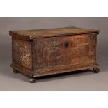 A small 17th Century Italian cedar Adige chest, the plain single-piece hinged top above the front