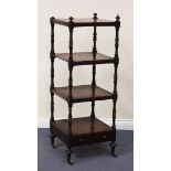 A Victorian mahogany four-tier whatnot on turned supports, fitted with a single drawer, on turned